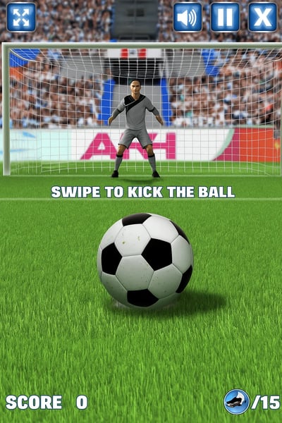 Soccer player in a grey uniform is about to kick the ball.